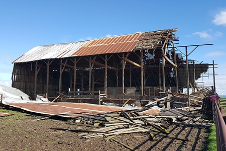 The barn east of campus sustained severe and irreparable damage during last month’s storms.