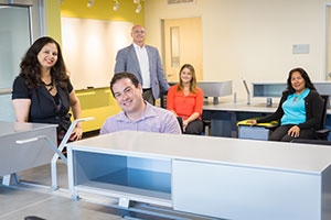 Venture Lab staff members Robert Goodman, front, Sonal Gadre, left, Peter Schuerman, back, Cara Baird, seated at left and Rosalina Aranda, seated at right, are already working with teams of students and researchers on potential start-up businesses.