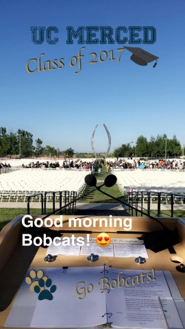 A view from the stage overlooking the chairs for commencement attendees