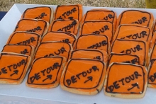 Cookies resembling detour signs on display at the groundbreaking ceremony.  
