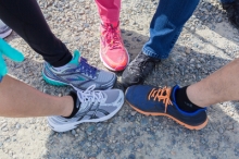 Several staff members put their best foot forward in athletic shoes.