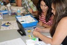 Educators learn topics including computer programming, Lego robotics, conductivity and circuits, math, and RNA and DNA.