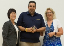 Pictured left to right: Chancellor Dorothy Leland, Staff Excellence Award winner Mort Peyvandi and Staff Assembly President Pam Taylor.