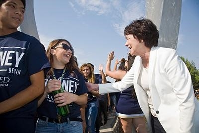 Chancellor Dorothy Leland greets students at Beginnings.