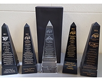 Image shows the five procurement awards UC Merced has won since 2011.