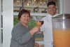Debbie Henderson and Executive Chef Mitch Vanagten toast with sangria during a fundraiser for the Staff Assembly Scholarship Fund